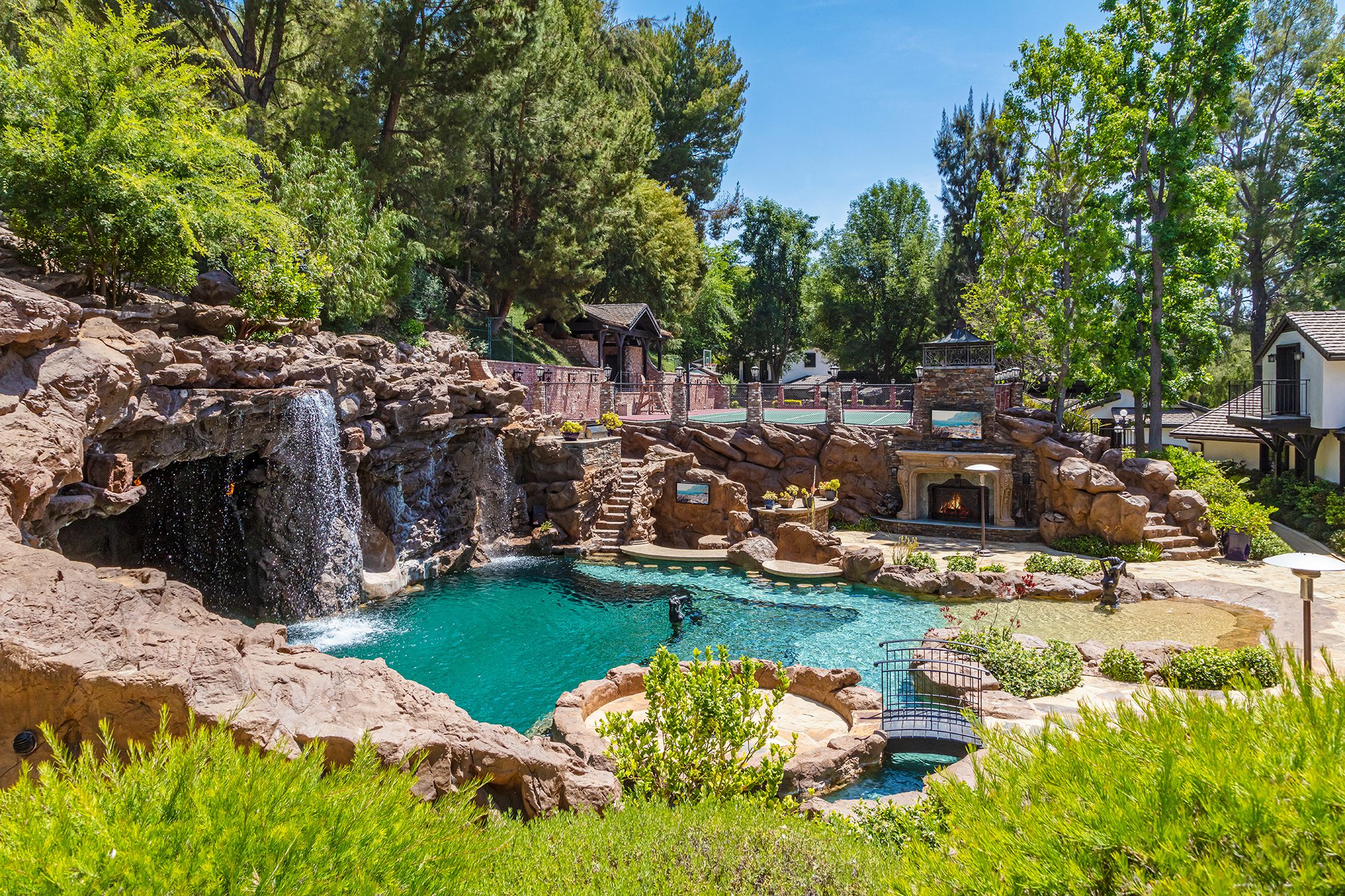 Full estate view of the pool and waterfalls