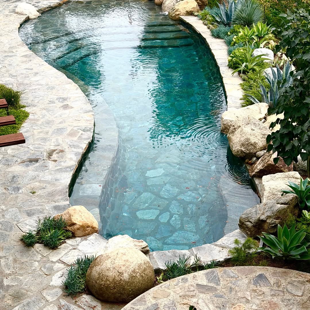 Natural flagstone pool inspired by Frank Lloyd Wright