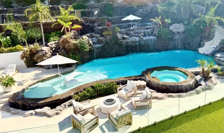 Gold-medal renovation project with waterfalls and spa by Ultimate Water Creations